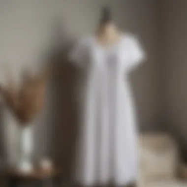 Sophisticated Design of Knee-Length Cotton Nightgown Elegant knee-length cotton nightgown displayed on a vintage mannequin