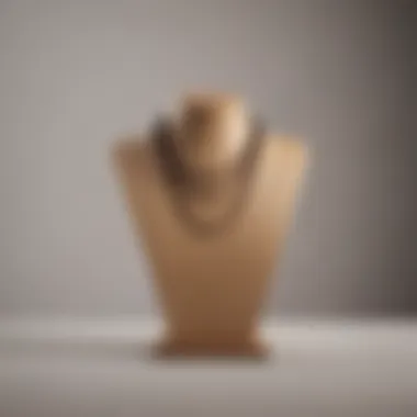 Minimalistic wooden necklace stand highlighting modern design aesthetics.